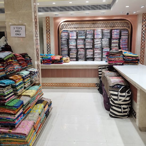 Store interior showcasing merchandise at ASRITHA FASHION MALL, Guntur
